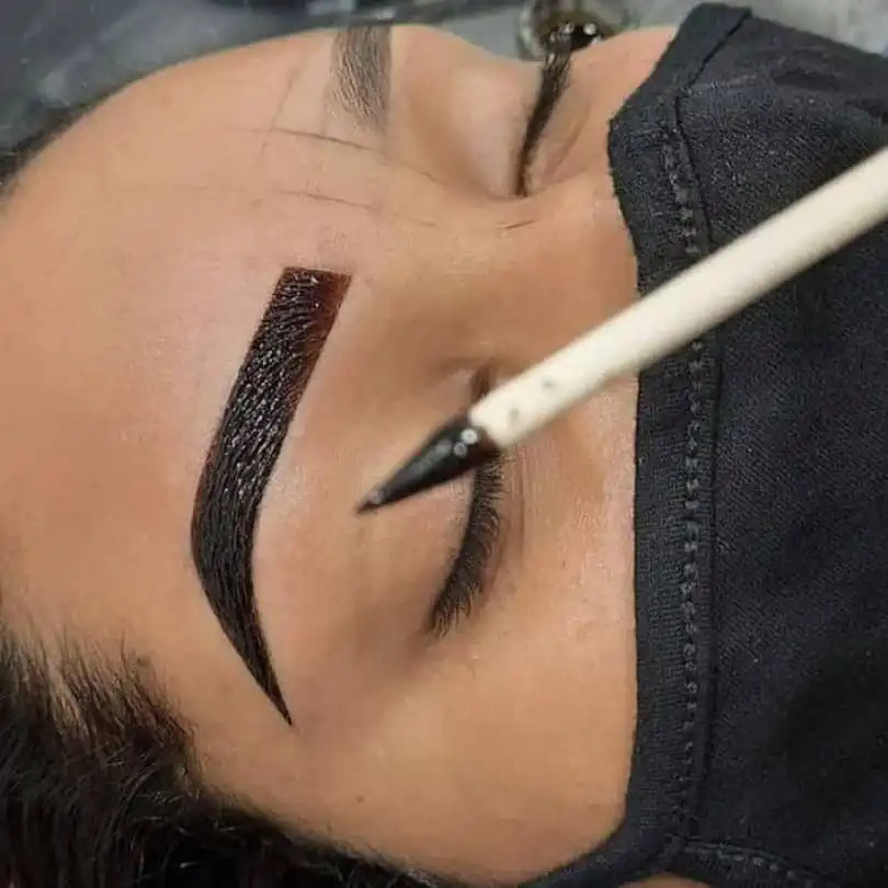 Henna brow treatment being applied